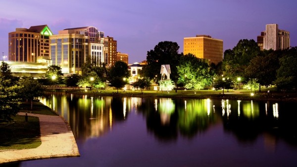 Cityscape scene of downtown Huntsville, Alabama, from Big Spring Park after sunset