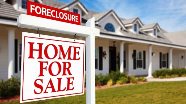 Foreclosure Home For Sale Real Estate Sign and House