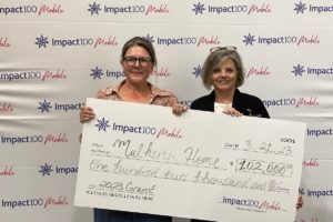 Impact100 Mobile celebrates its first grant recipient
