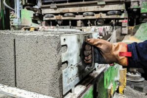 Alabama company launches commercial production of ultra-low-carbon concrete blocks