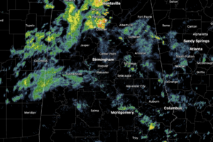 Midday Nowcast: Occasional Rain and Storms through the Weekend